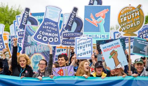 Young people holding a rally to advocate for science communication 